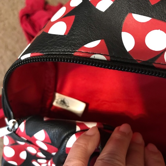 A beautiful Mini Disney Backpack with one packet outside. - Picture 7 of 9